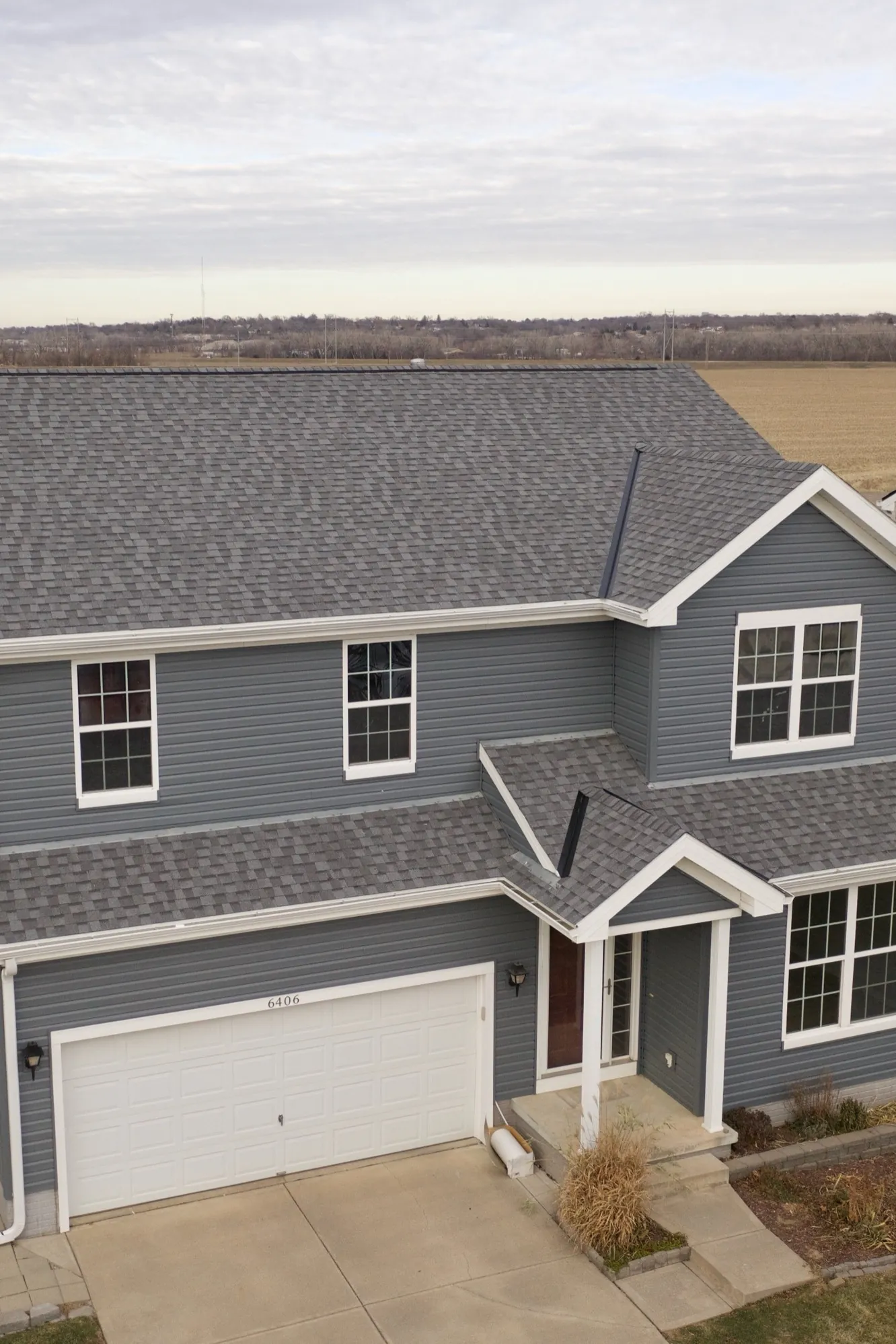 New construction home under exterior finishing