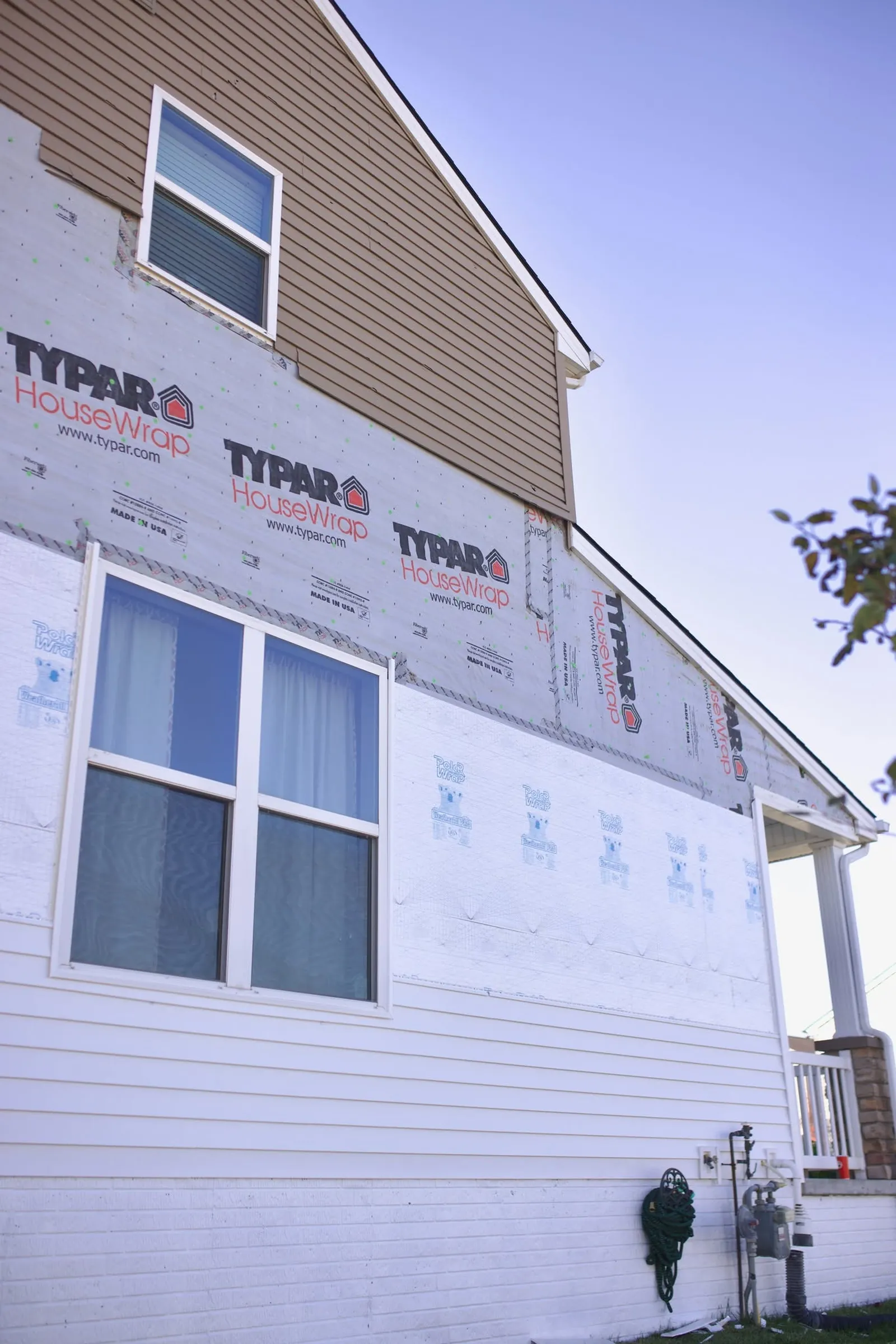 Downspout and gutter system along the edge of a home